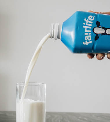 Milk being pour into glass